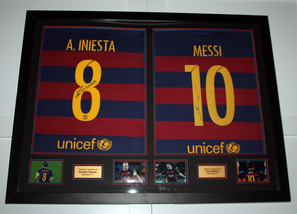 Lionel Messi & Andrés Iniesta Autographed FC Barcelona Jerseys – Dual Framed Display with Famous Memorabilia COA