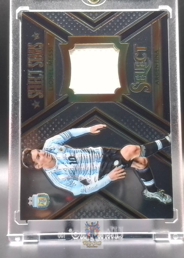   2015-16 Panini Lionel Messi card is from the Select Stars Memorabilia set, card #ST-LM, featuring Serial Numbered, Memorabilia 64/199. Messi Cards 5